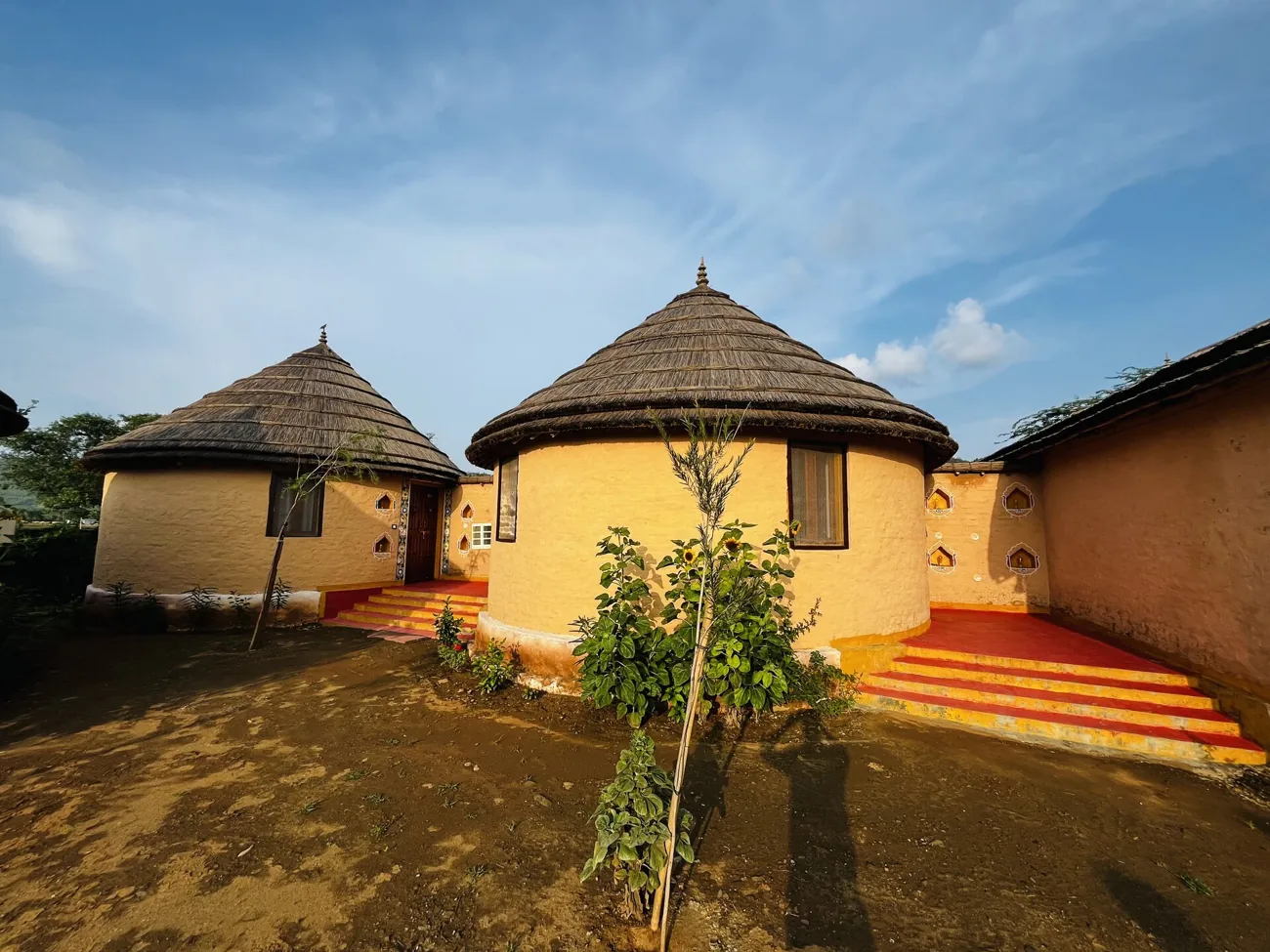 Mud Cottage with traditional earthen architecture at Sariska Tiger Lodge
